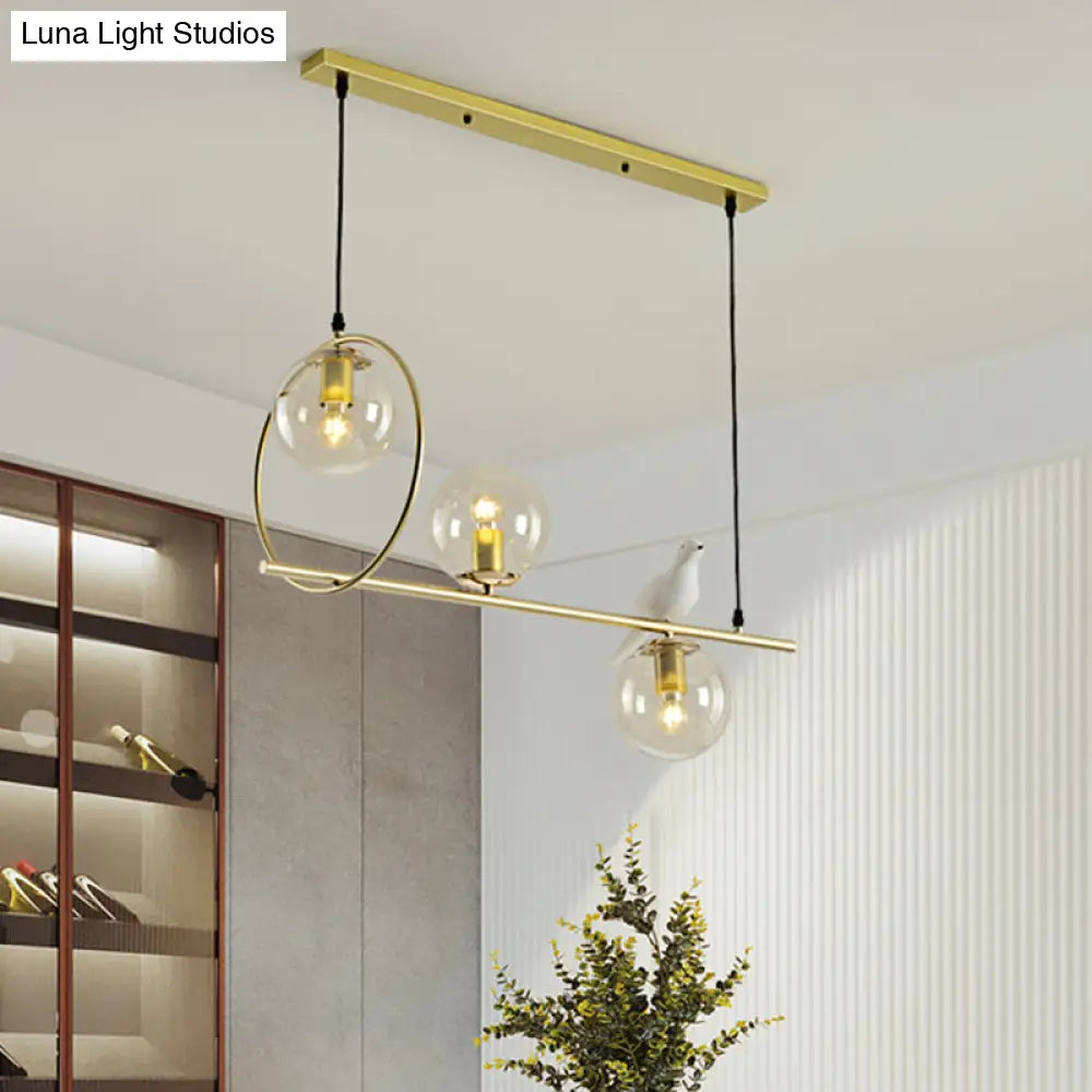 DecorBites™ Modern Clear Glass Pendant Light Fixture with White Bird - Global Island Lamp, Gold Trim, 3 Heads