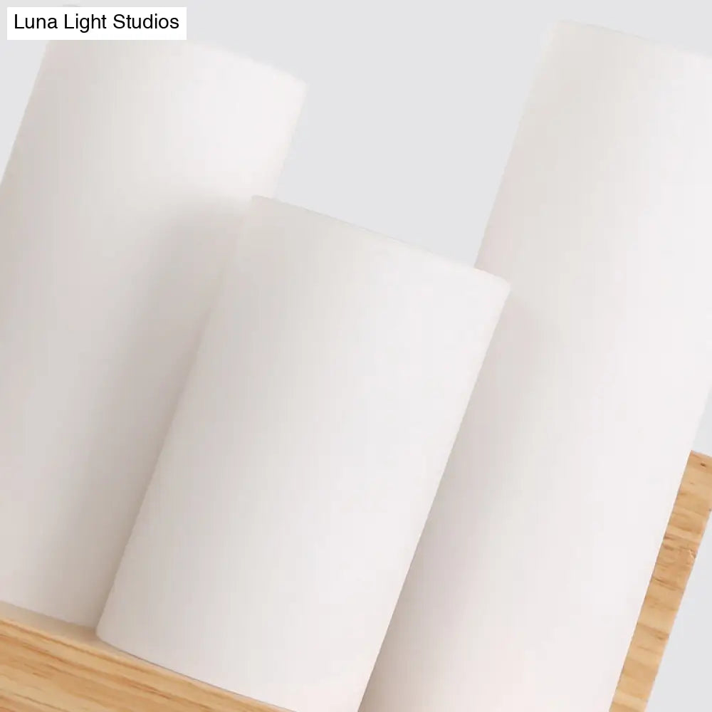 DecorBites™ 3-Head Contemporary Tube Shade Wall Lamp with Wooden Shelf – Perfect for Cloth Shop