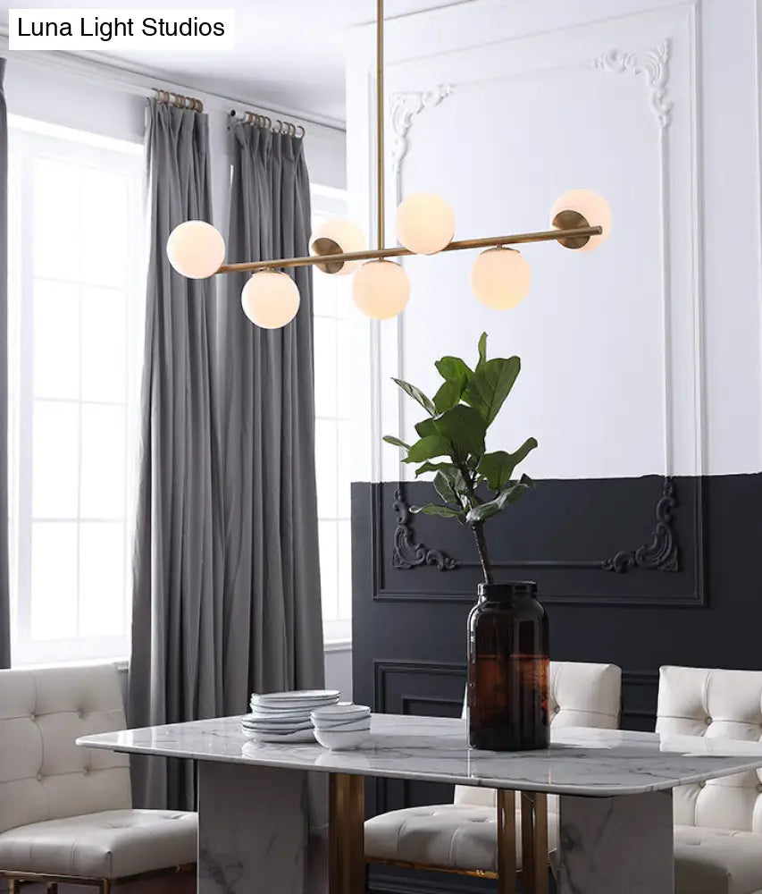 DecorBites™ 7-Light Modern Gold Metal Island Pendant with Spherical White Glass - Ideal for Dining Table