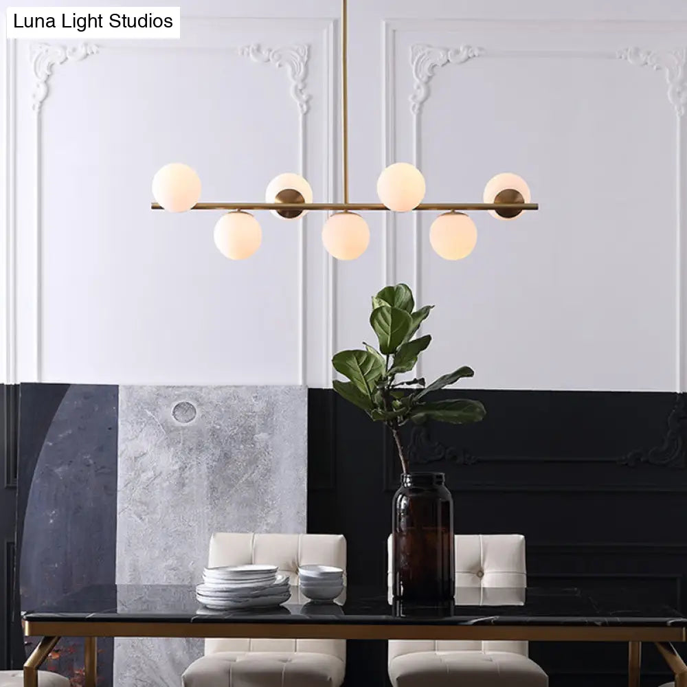 DecorBites™ 7-Light Modern Gold Metal Island Pendant with Spherical White Glass - Ideal for Dining Table