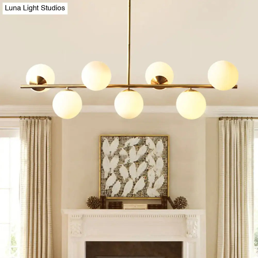 DecorBites™ 7-Light Modern Gold Metal Island Pendant with Spherical White Glass - Ideal for Dining Table