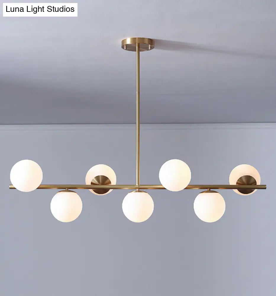 DecorBites™ 7-Light Modern Gold Metal Island Pendant with Spherical White Glass - Ideal for Dining Table