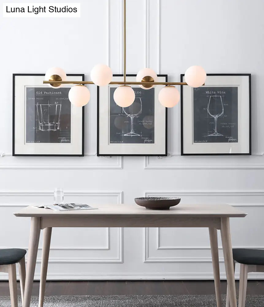 DecorBites™ 7-Light Modern Gold Metal Island Pendant with Spherical White Glass - Ideal for Dining Table