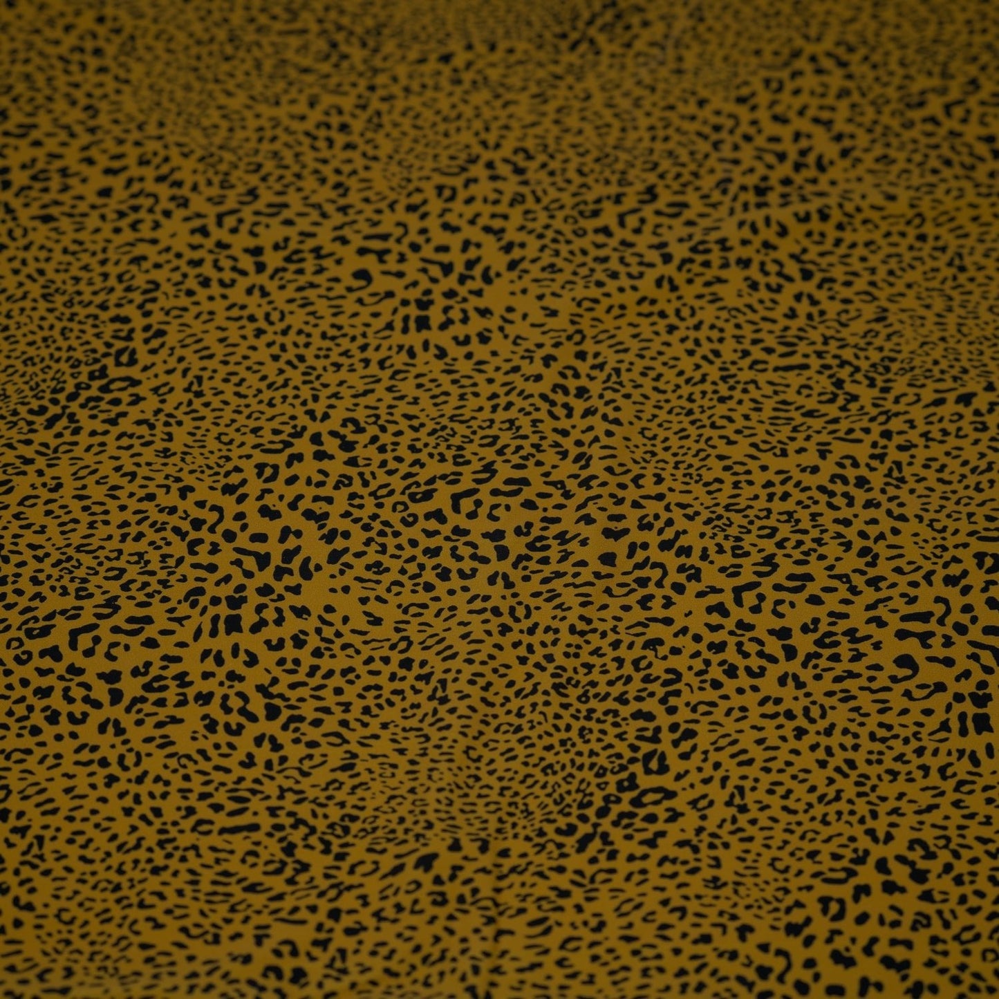 Finely Spotted Cheetah Printed Spandex Fabric | Blue Moon Fabrics