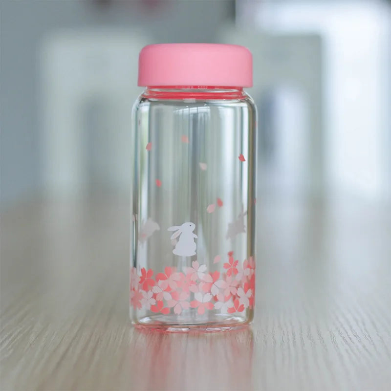 DecorBites™ Kawaii Sakura Glass Water Bottle 310ml Cute Cartoon Animal Design