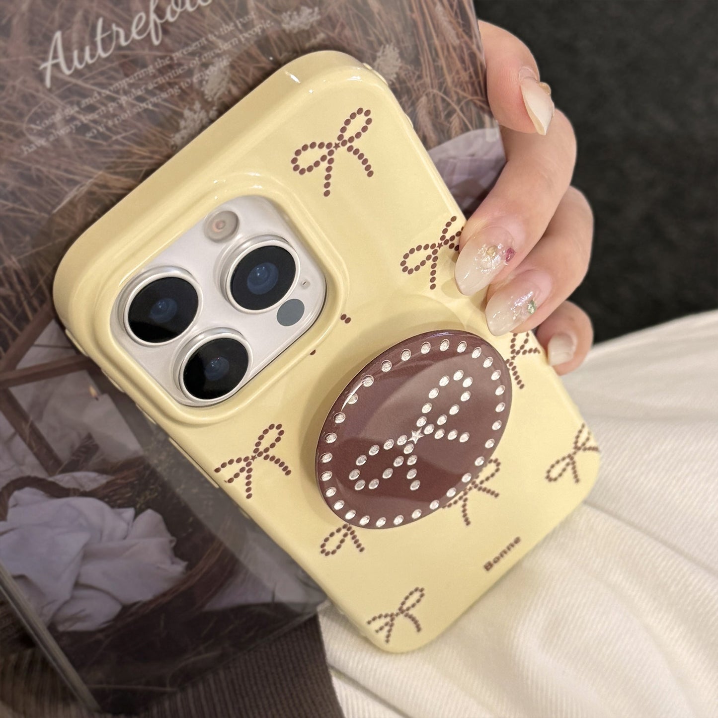 Gilt polka dot bow holder Apple 17 mobile phone case iphone16promax is suitable for 14 personalities 16 all-inclusive.