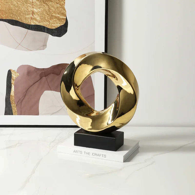 DecorBites™ Geometric Gold Hollowed Twisted Circles Figurines Home Decor