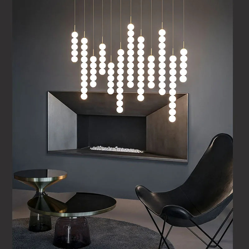 DecorBites™ Art Deco LED Glass Pingpong Pendant Light in Gold Chrome Black.