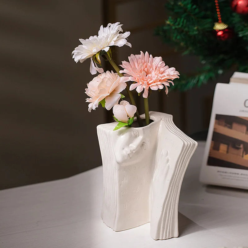 DecorBites™ Ceramic Man Face Book Stand Vase for Room Decor and Storage