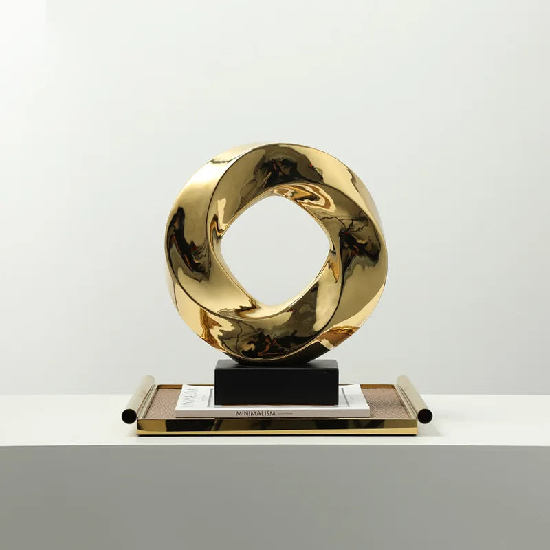 DecorBites™ Geometric Gold Hollowed Twisted Circles Figurines Home Decor