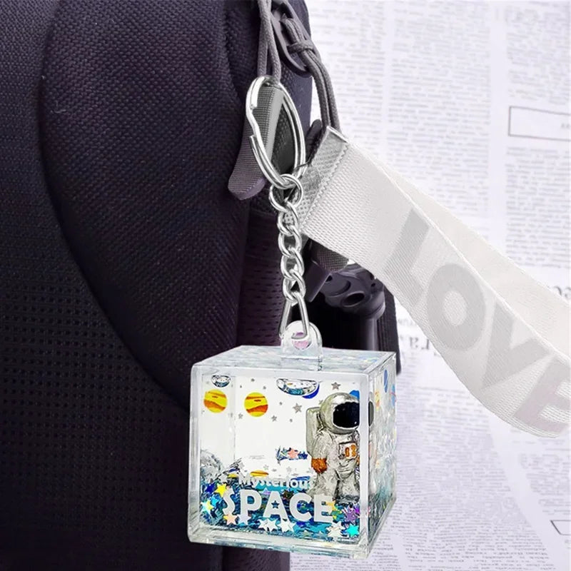 DecorBites™ Astronaut Drift Keychain: Creative Liquid Hourglass Stress Relief Toy & Home Decor