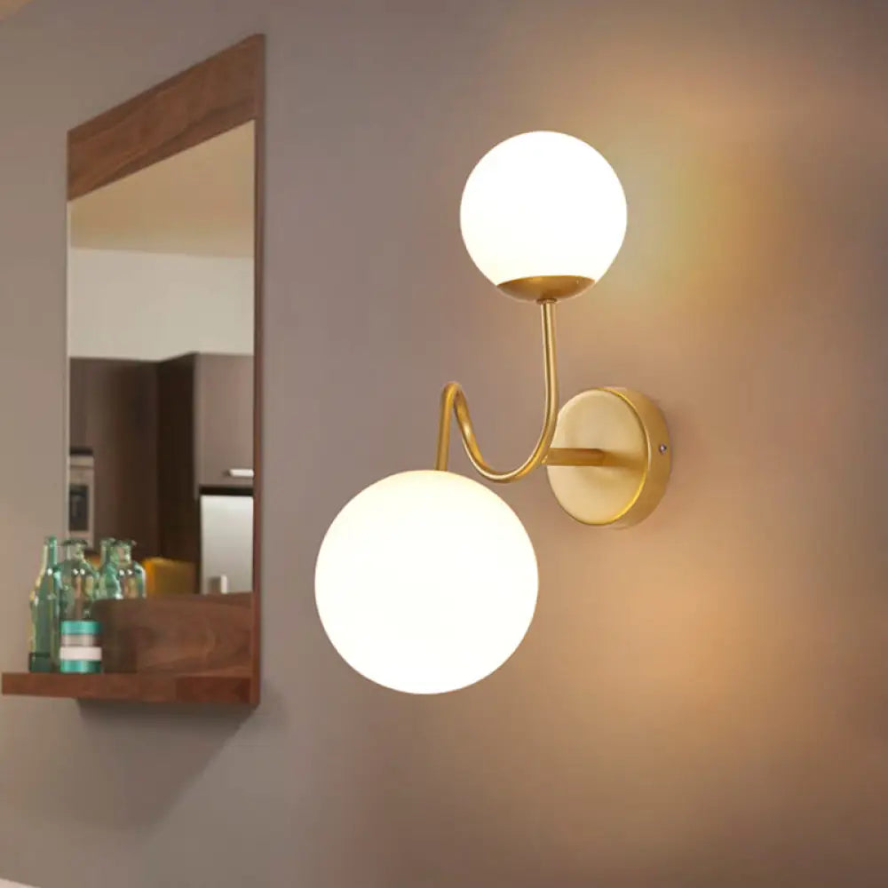 DecorBites™ Contemporary Gold Metal Wall Sconce with Curved Arms, 2 Heads, and White Glass Shade