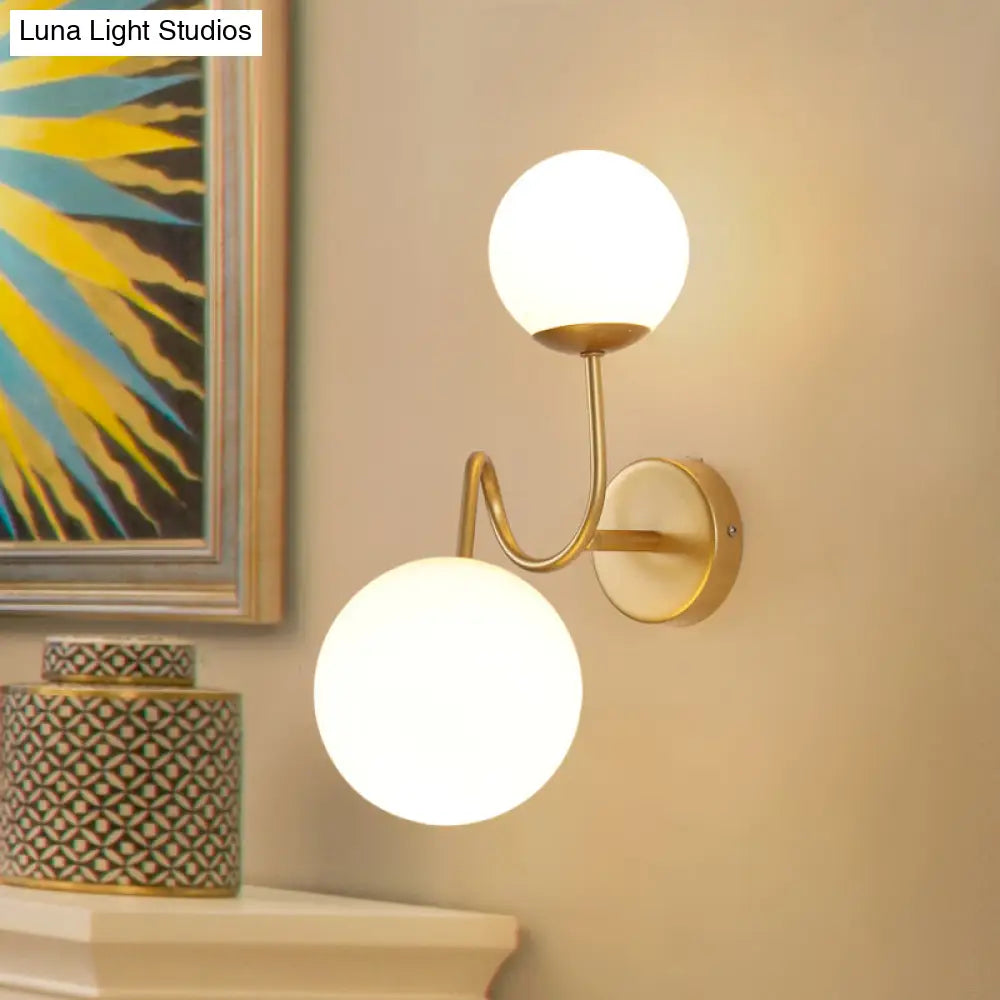 DecorBites™ Contemporary Gold Metal Wall Sconce with Curved Arms, 2 Heads, and White Glass Shade