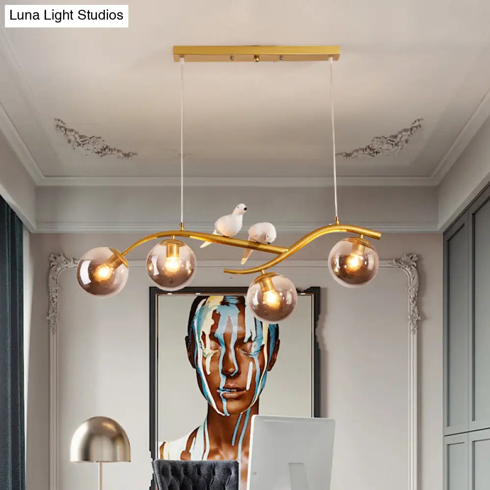 DecorBites™ Contemporary Metal Branch Hanging Lamp Island Pendant - 4-Light Black/Gold with Bird Deco and Smoke Grey/Cognac Glass Shade