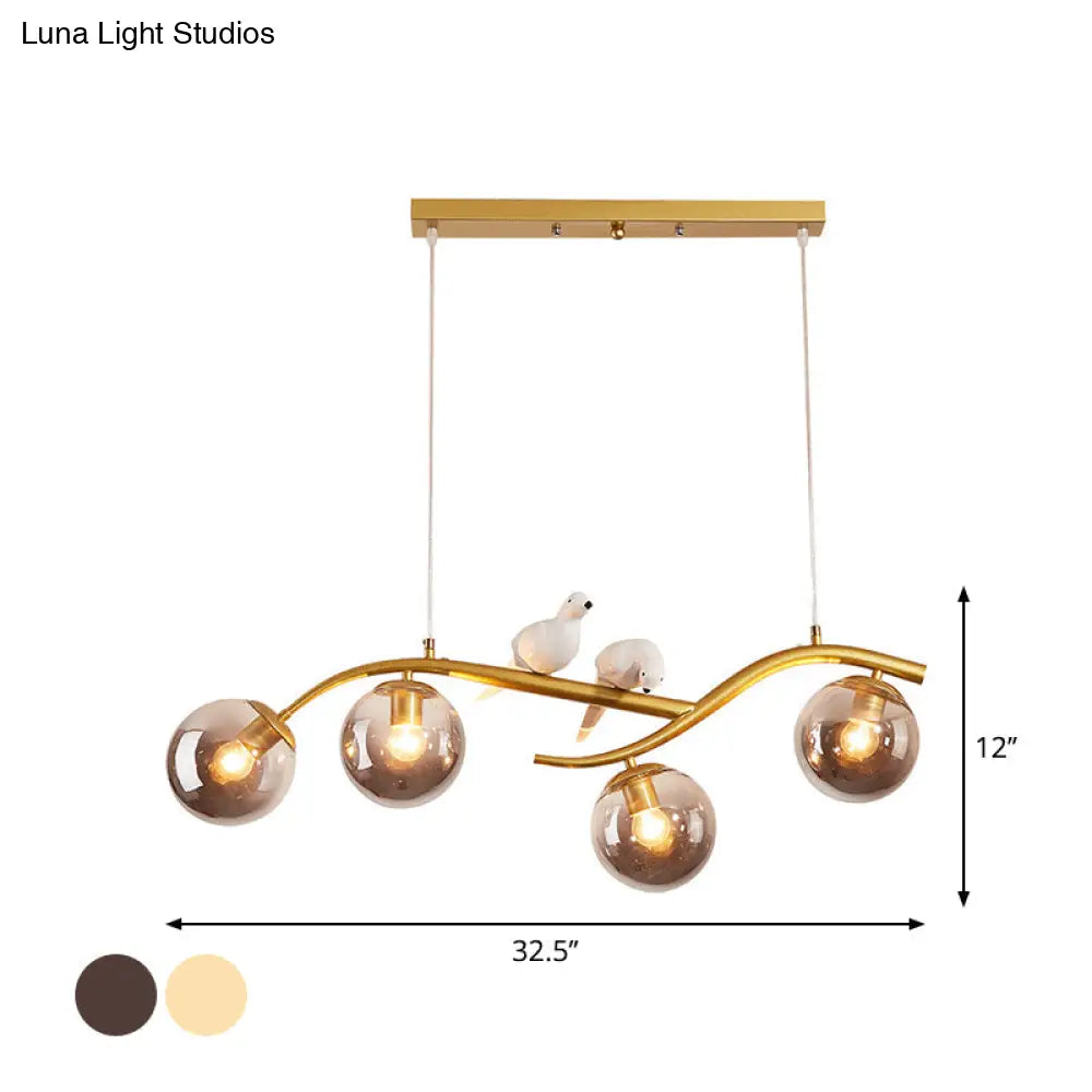 DecorBites™ Contemporary Metal Branch Hanging Lamp Island Pendant - 4-Light Black/Gold with Bird Deco and Smoke Grey/Cognac Glass Shade