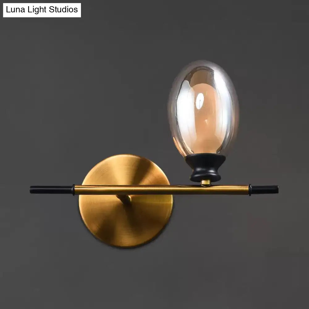 DecorBites™ Mid Century Brass Wall Lamp with Dual Oval Clear/Amber Glass Shade