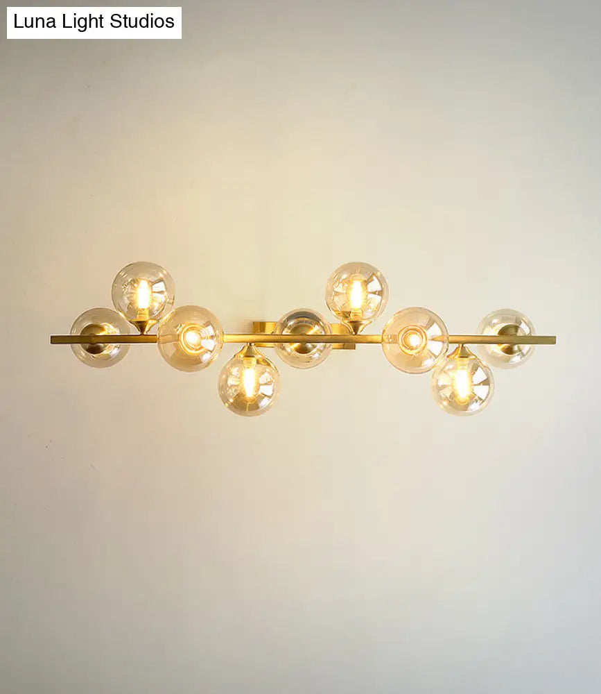 DecorBites™ Mid-Century Modern Gold Metal Pendant with Spherical Amber Glass - Island Ceiling Light for Dining Table