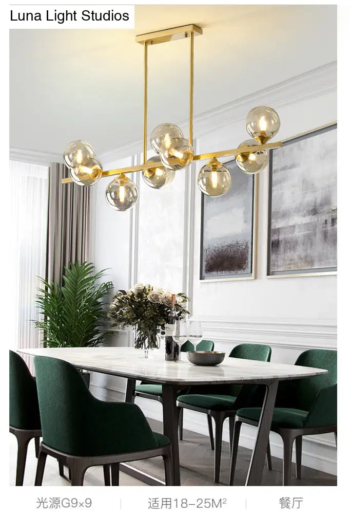DecorBites™ Mid-Century Modern Gold Metal Pendant with Spherical Amber Glass - Island Ceiling Light for Dining Table