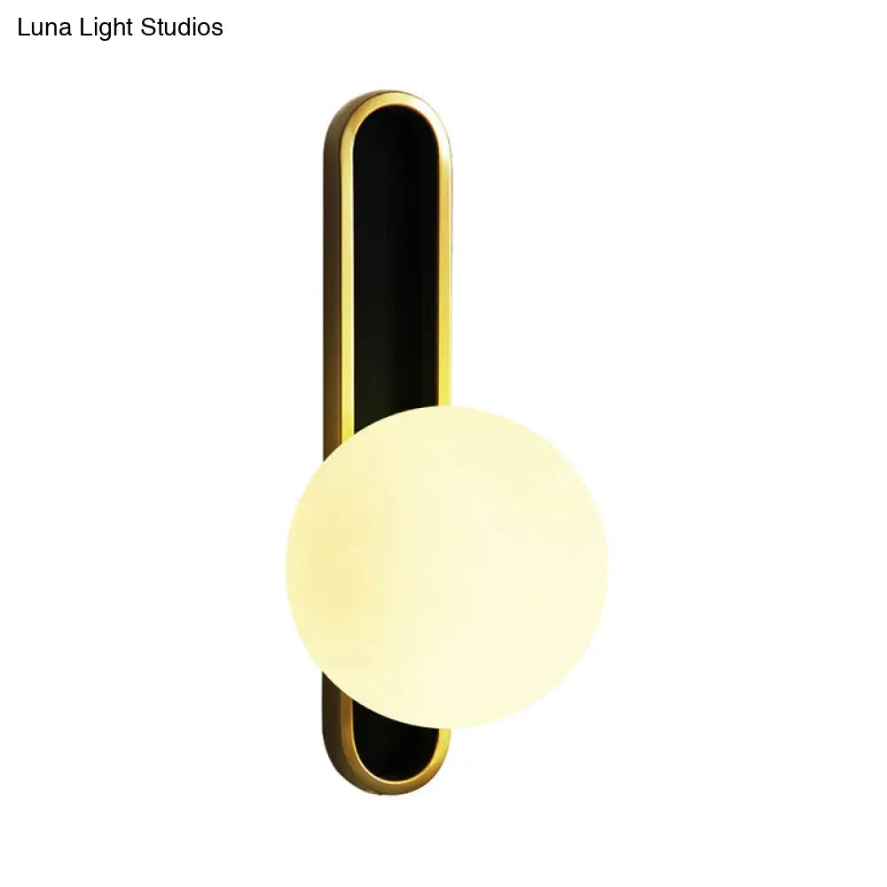 DecorBites™ Modern Clear/Cream Glass Orb Wall Light with Brass Mount