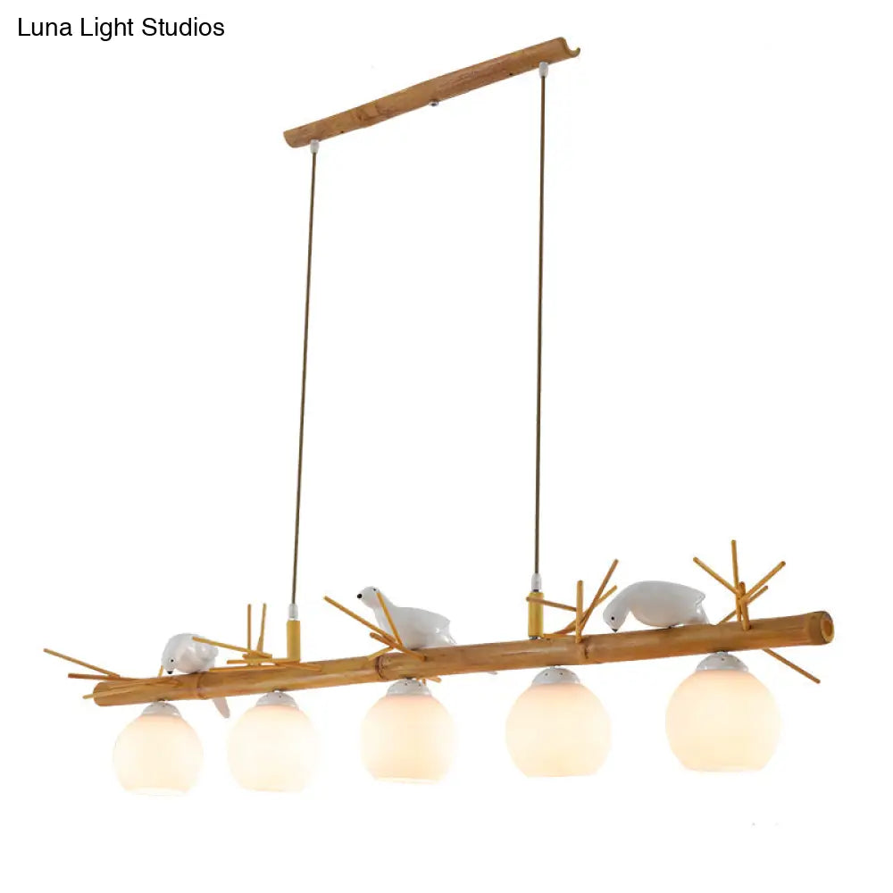 DecorBites™ Modern Cream Glass Wood Pendant Light with White Bird Deco - Dome Island Fixture