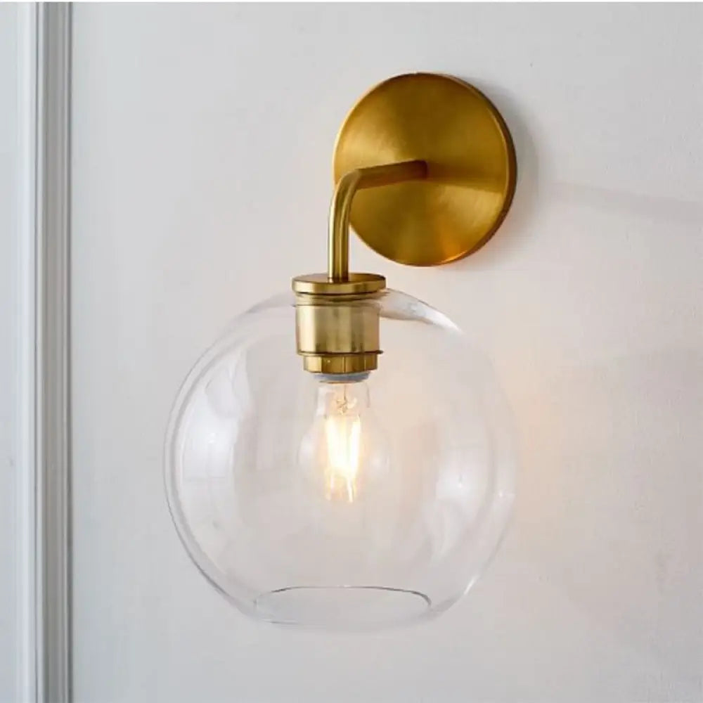 DecorBites™ Modern Glass Orb Wall Sconce with Brass Arm, Clear/White