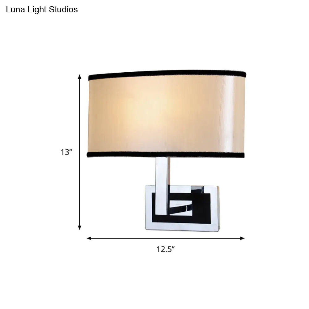 DecorBites™ Modern Oval Wall Sconce: Chrome LED Fabric Lighting for Bedside