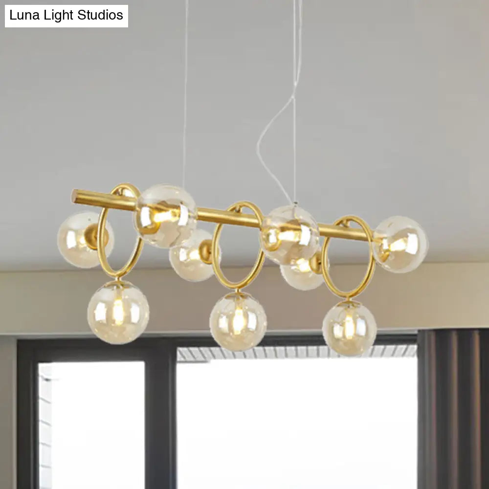 DecorBites™ Nordic Style Gold Pendant Light with Clear/Cognac Glass - Bubble Island Lighting, 9 Lights