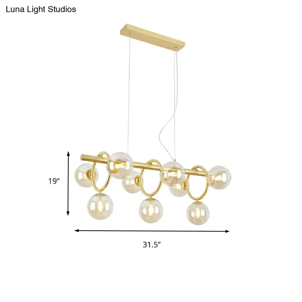 DecorBites™ Nordic Style Gold Pendant Light with Clear/Cognac Glass - Bubble Island Lighting, 9 Lights