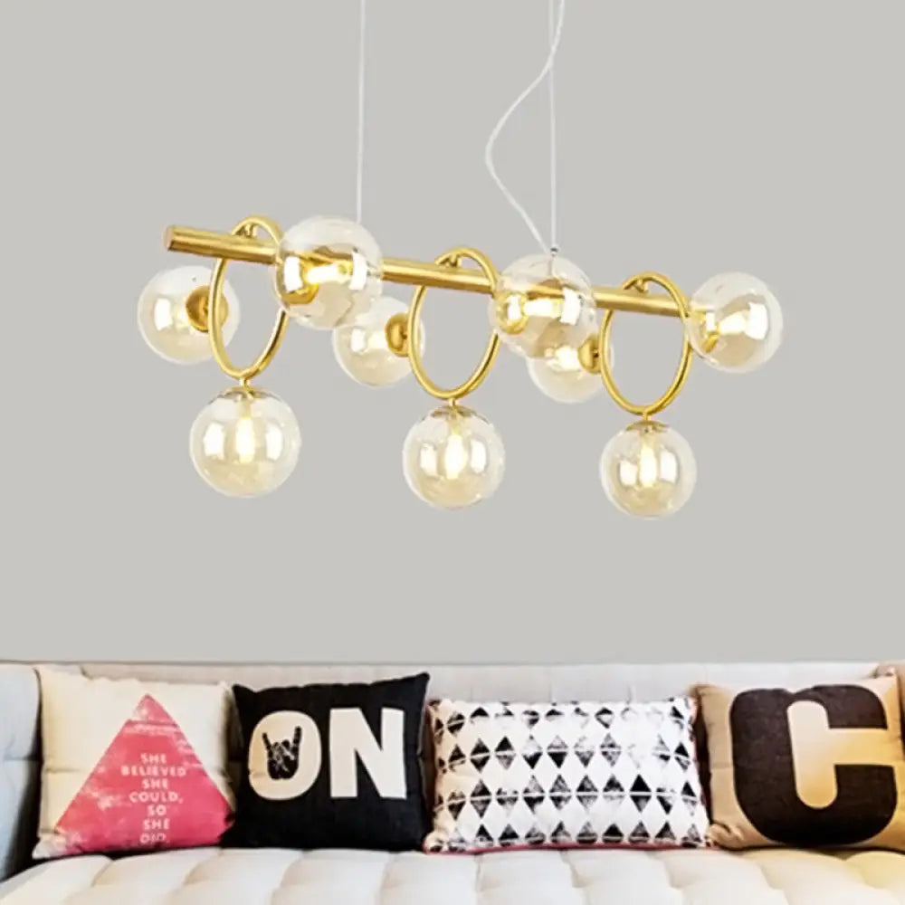 DecorBites™ Nordic Style Gold Pendant Light with Clear/Cognac Glass - Bubble Island Lighting, 9 Lights