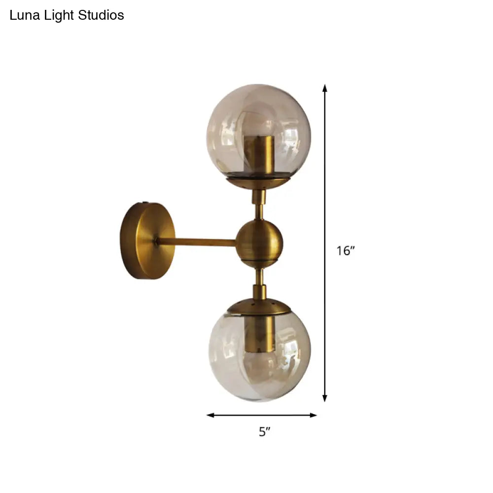 DecorBites™ Post Modern Amber Glass Globe Wall Sconce with Brass Mount - 1/2 Light