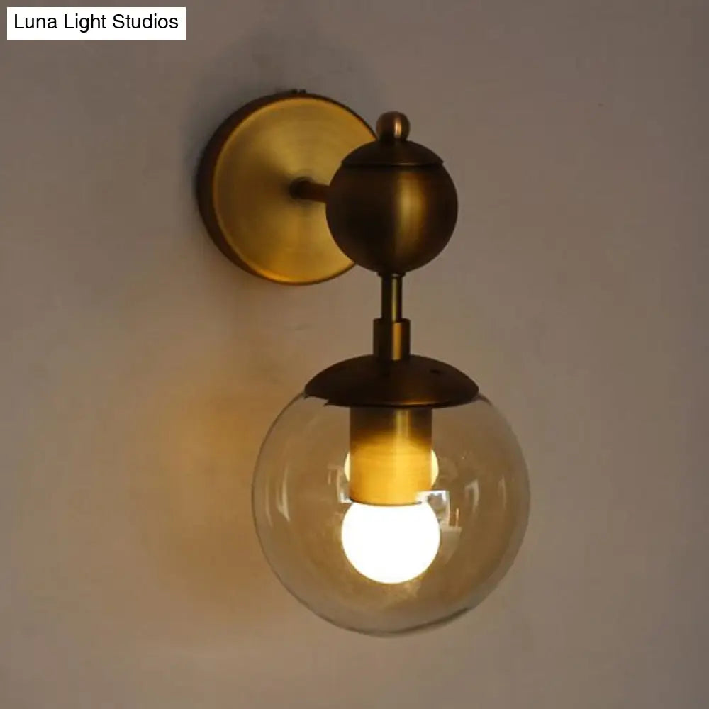 DecorBites™ Post Modern Amber Glass Globe Wall Sconce with Brass Mount - 1/2 Light