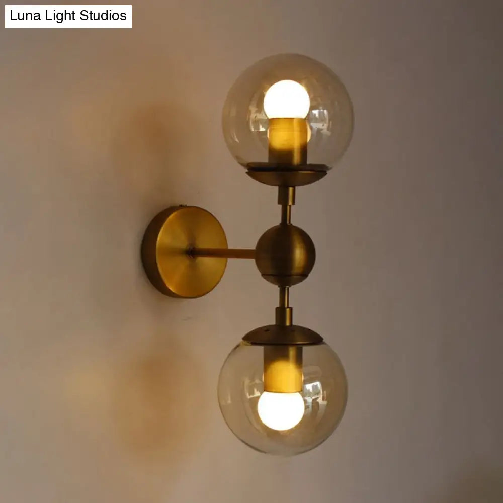 DecorBites™ Post Modern Amber Glass Globe Wall Sconce with Brass Mount - 1/2 Light