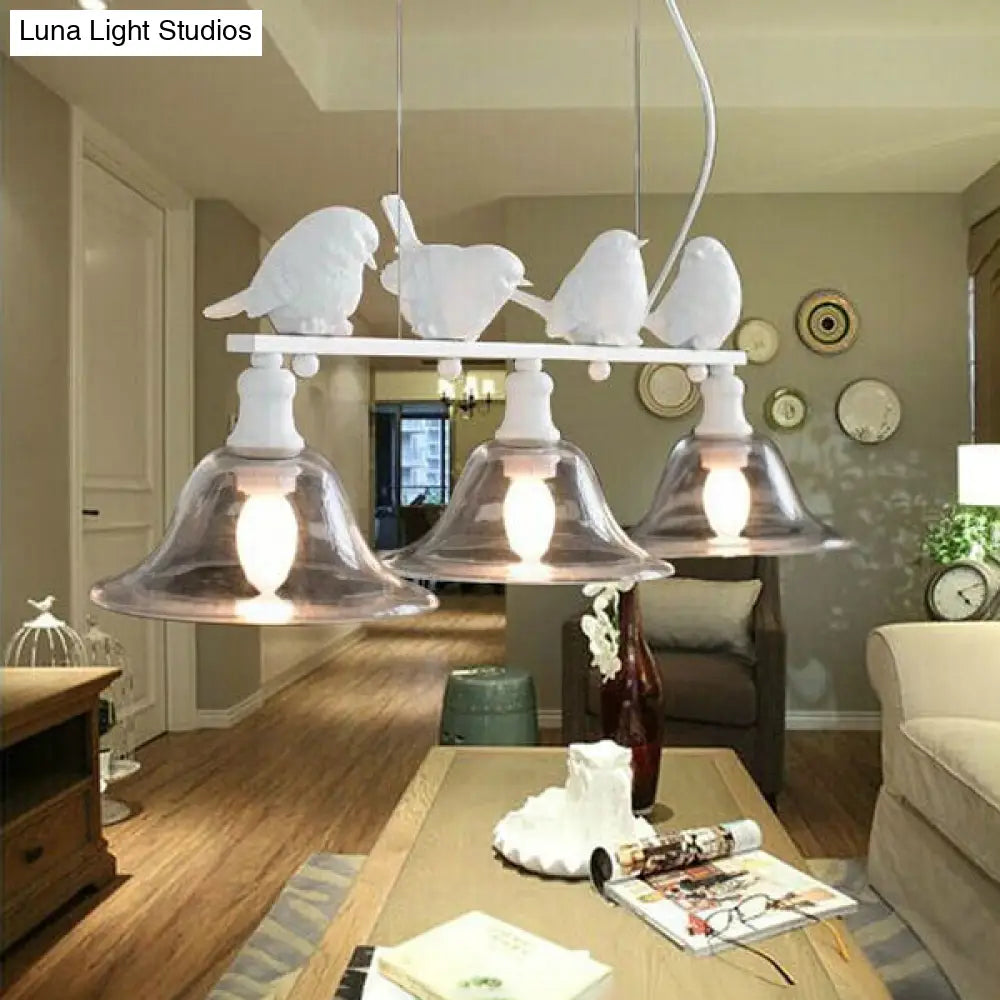 DecorBites™ Rustic Black Island Pendant Lamp with Clear Glass, 3 Bulbs, Flared Design & Bird Decoration - Perfect for Kitchen Lighting