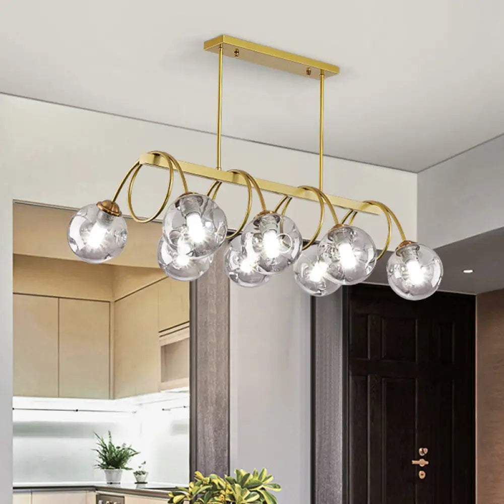 DecorBites™ Sleek Gold Spiral Island Light - Post-Modern Metal Ceiling Hang Lamp with Ball Glass Shade