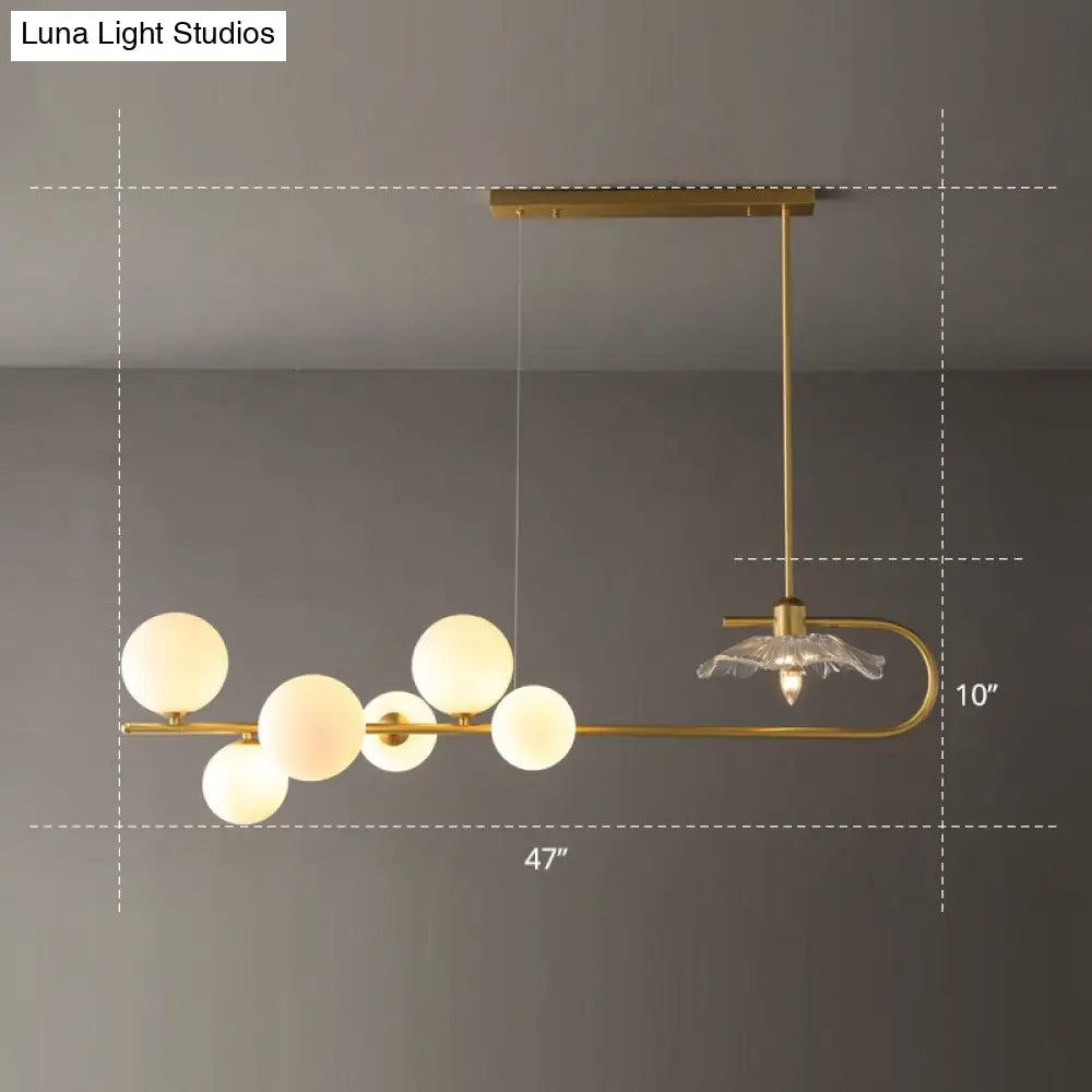 DecorBites™ Stylish Brass Finish Postmodern Suspension Lamp with Glass Shade - Creative Island Light featuring Ball and Lotus Leaf Design