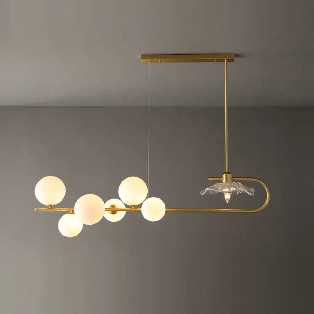 DecorBites™ Stylish Brass Finish Postmodern Suspension Lamp with Glass Shade - Creative Island Light featuring Ball and Lotus Leaf Design